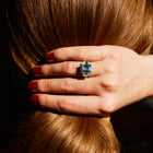 Blue Emerald Cut with white sides