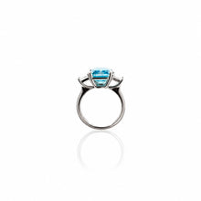 Blue Emerald Cut with white sides