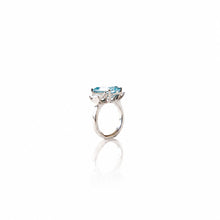 Blue Emerald Cut with white sides