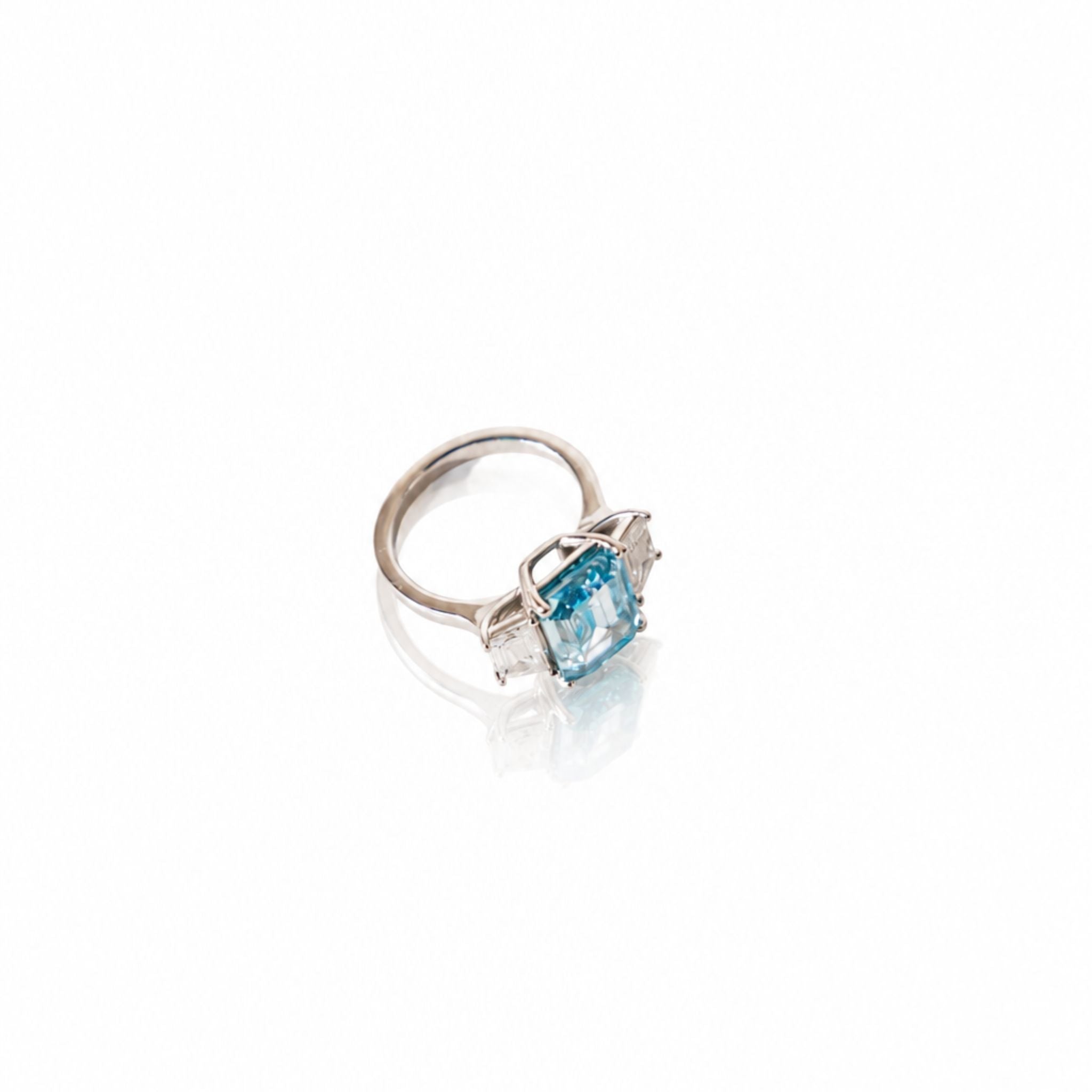 Blue Emerald Cut with white sides