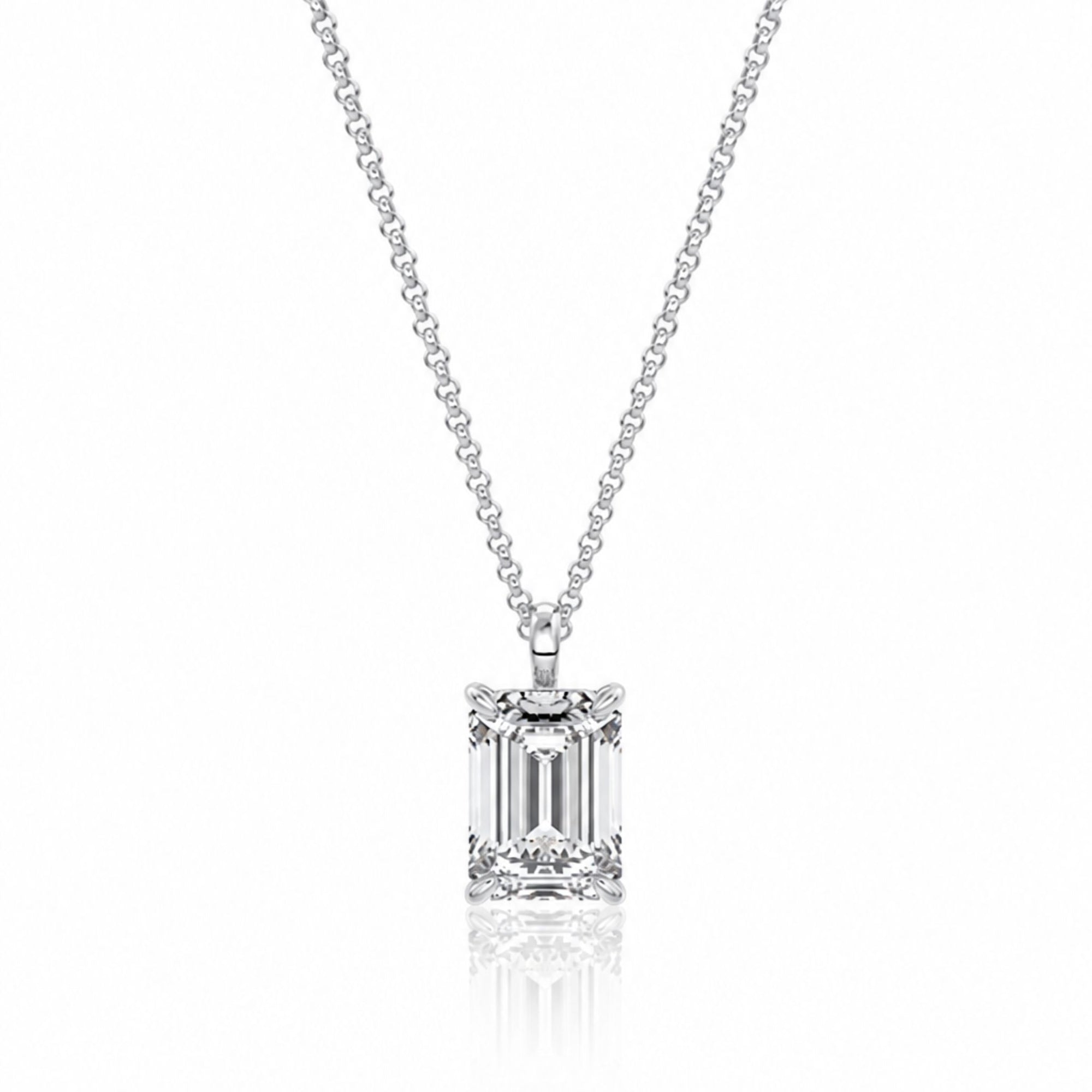 Diamond necklace with emerald-cut pendant on a white background