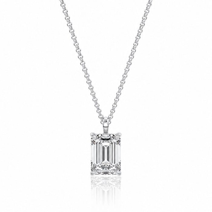 Diamond necklace with emerald-cut pendant on a white background